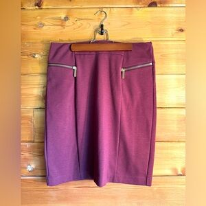 Michael Kors skirt - burgundy with gold tone details & faux-pockets.